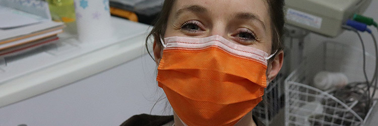 Healthcare worker in surgical mask 